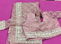 AFL3071 Partywear net saree in beige with silver bead and sequin embroidery.Comes with stitched blouse size 40,can be altered to 44 size.Fall peco done.