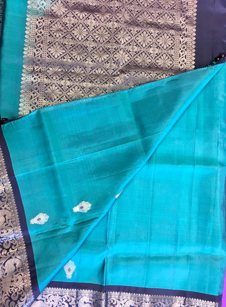 Pure kanchipuram Handloom Silk Saree in Blue with Brown Zari border. Comess with Stitched Blouse size 38 can be altered up to 44