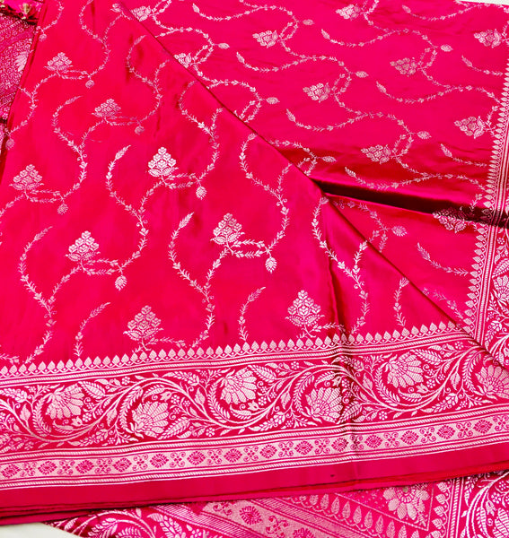 BKS123 Banarasi Mashru silk Saree in pink.Comes with gold zari work. Comes with stitched blouse size 38 can be altered to size 42. Fall peco done.
