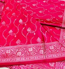 BKS123 Banarasi Mashru silk Saree in pink.Comes with gold zari work. Comes with stitched blouse size 38 can be altered to size 42. Fall peco done.