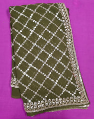 AFL3069 Partywear saree in green georgette fabric with silver sequins embroidery work.Comes with stitched blouse size 40,can be altered to 44 size.Fall peco done.