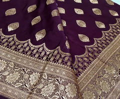 BKS127 Banarasi Mashru silk Saree in brown. Comes with gold zari work. Comes with stitched blouse size 38 can be altered to size 42. Fall peco done.