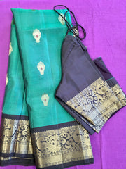 Pure kanchipuram Handloom Silk Saree in Blue with Brown Zari border. Comess with Stitched Blouse size 38 can be altered up to 44