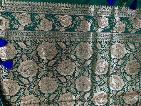 BKS120 Banarasi Mashru silk Saree in green. Comes with gold zari work. Comes with stitched blouse size 38 can be altered to size 42. Fall peco done.