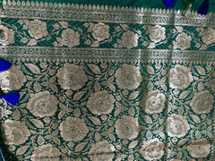BKS120 Banarasi Mashru silk Saree in green. Comes with gold zari work. Comes with stitched blouse size 38 can be altered to size 42. Fall peco done.