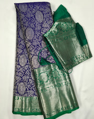 KSS507 Pure kanchipuram handloom silk Saree in purple with green color gold zari border. comes with stitched blouse size 40,can be altered to 44 size.