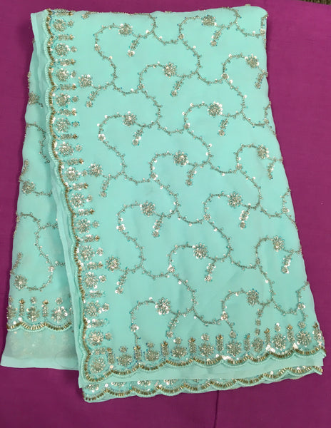 AFL3060 Partywear saree in blue with sequins and bead work.Come with stitched blouse size 40,can be altered to 44 size.Fall peco done.