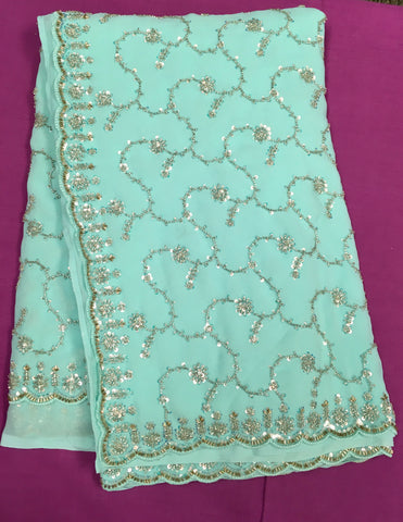 AFL3060 Partywear saree in blue with sequins and bead work.Come with stitched blouse size 40,can be altered to 44 size.Fall peco done.