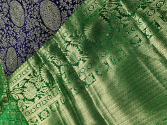 KSS507 Pure kanchipuram handloom silk Saree in purple with green color gold zari border. comes with stitched blouse size 40,can be altered to 44 size.