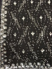 AFL3063 Partywear georgette saree in black with silver sequin and bead embroidery work.Comes with stitched blouse size 40,can be altered to 44 size.Fall peco done.