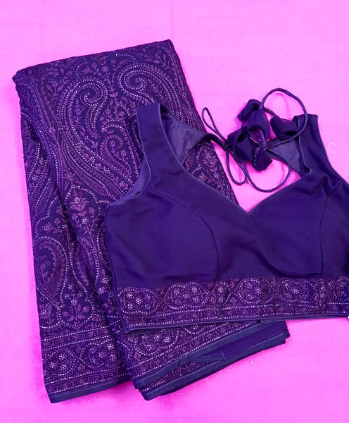 AFL3061 Georgette Party Wear saree in purple comes with Chickenkary Embroidery and stone work. Come with stitched blouse size 38 can be altered to 42.Fall peco done.