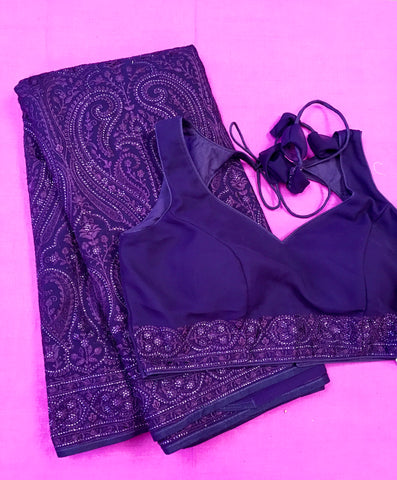 AFL3061 Georgette Party Wear saree in purple comes with Chickenkary Embroidery and stone work. Come with stitched blouse size 38 can be altered to 42.Fall peco done.
