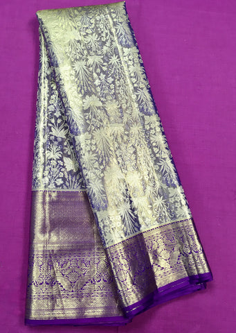 KSS449 Pure kanchipuram tissue silk Saree in purple with gold zari work.comes with stitched blouse size 40,can be altered to 44 size.