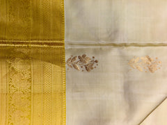 KSS456 Pure handloom kanchipuram silk Saree in sandal yellow with yellow gold zari border.comes with stitched blouse size 40,can be altered to 44 size.