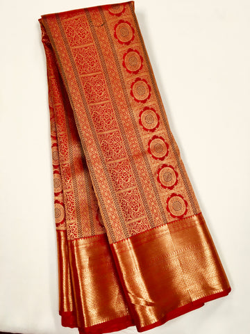 KSS517 Pure kanchipuram handloom silk Saree in orang color with gold zari border. comes with stitched blouse size 40,can be altered to 44 size.