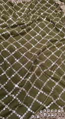 AFL3069 Partywear saree in green georgette fabric with silver sequins embroidery work.Comes with stitched blouse size 40,can be altered to 44 size.Fall peco done.