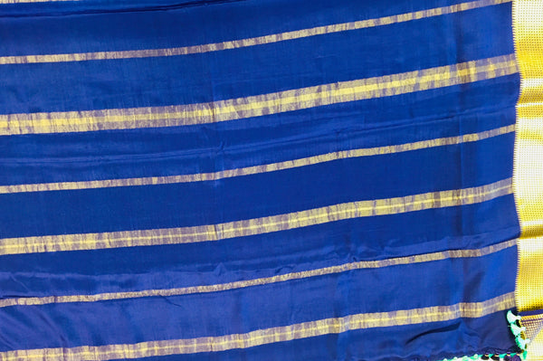AMS1001 Pure Mysore Crepe silk Saree in blue color with dark blue gold zari border. Comes with unstitched blouse.