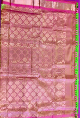 Pure kanchipuram Handloom Silk Saree in Parrot Green with Light Pink Zari border. Comes with Stitched Blouse size 38 can be altered up to 44
