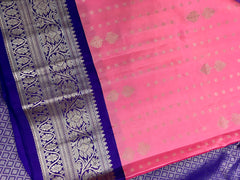 KSS430 Pure handloom kanchipuram silk Saree in pink with purple gold zari border.comes with stitched blouse size 40,can be altered to 44 size.