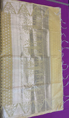 Semi Raw mango Saree in yellow with Silver  Zari Border.Fall peco done. Comess with stitched blouse size 38 can be altered up to 44
