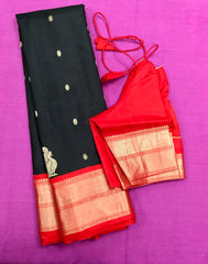 KSS428 Pure handloom kanchipuram silk Saree in black with red gold zari border.comes with stitched blouse size 40,can be altered to 44 size.