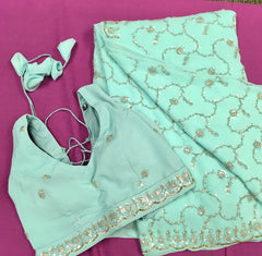 AFL3060 Partywear saree in blue with sequins and bead work.Come with stitched blouse size 40,can be altered to 44 size.Fall peco done.