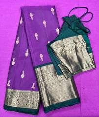 KSS411 Pure kanchipuram silk Saree in purple and green gold zari border.comes with stitched blouse size 40,can be altered to size 44.Fall peco done.