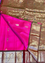 Pure kanchipuram Handloom Silk Saree in pink with Brown Zari border. Comess with Stitched Blouse size 38 can be altered up to 44