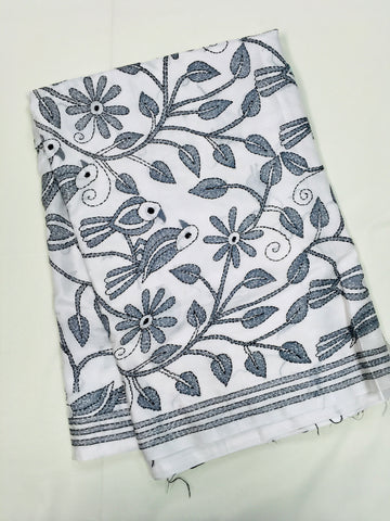 KSN211 Semi Silk Kantha Tusser Saree in white hand work design. Comes with stitched Blouse.