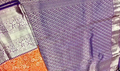 KSS415 Pure kanchipuram tissue silk Saree in orange with purple border gold zari work.comes with stitched blouse size 40,can be altered to 44 size.