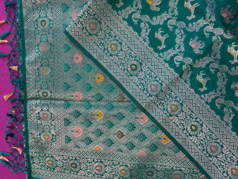 semi silk banarasi Saree in Green with Zari Border. Comes with stitched blouse size 38 can be altered up to 44
