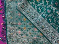semi silk banarasi Saree in Green with Zari Border. Comes with stitched blouse size 38 can be altered up to 44