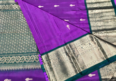 KSS411 Pure kanchipuram silk Saree in purple and green gold zari border.comes with stitched blouse size 40,can be altered to size 44.Fall peco done.