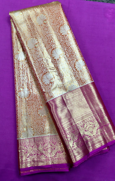 KSS450 Pure kanchipuram tissue silk Saree in orange with gold zari work.comes with stitched blouse size 40,can be altered to 44 size.