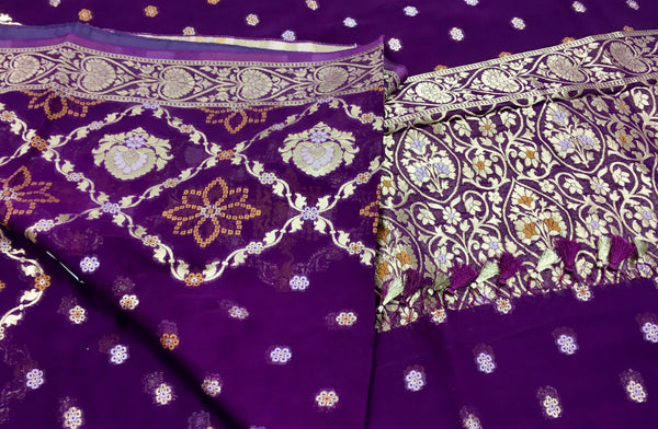 BKS105 Banarasi Georgette saree in purple. Come with stitched blouse size 38 can be altered to size 42. Fall peco done.