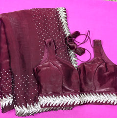 AFL3054 Partywear saree in wine with silver embroidery.Comes with stitched blouse size 40,can be altered to 44 size.Fall peco done.