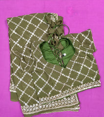 AFL3069 Partywear saree in green georgette fabric with silver sequins embroidery work.Comes with stitched blouse size 40,can be altered to 44 size.Fall peco done.