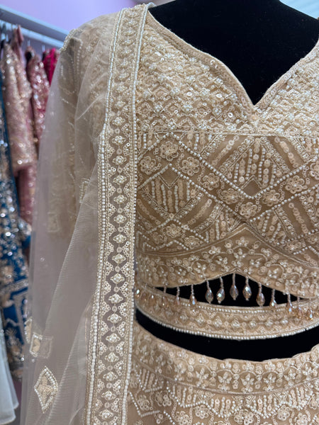 AFL2005- Beige heavy work lehenga with bead and sequin work. Comes with dupatta and belt