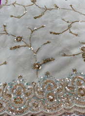 AFL3056 Partywear saree in white with  sequins and bead work.Comes with stitched blouse size 38,can be altered to 42size.Fall peco done.