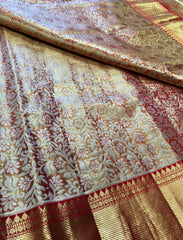 KSS510 Pure kanchipuram tissue silk Saree in orange with gold zari work.comes with stitched blouse size 40,can be altered to 44 size.