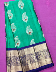 KSS404 Pure handloom kanchipuram silk Saree in greenery with blue gold zari border.comes with stitched blouse size 40,can be altered to 44 size.