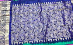 KSS404 Pure handloom kanchipuram silk Saree in greenery with blue gold zari border.comes with stitched blouse size 40,can be altered to 44 size.