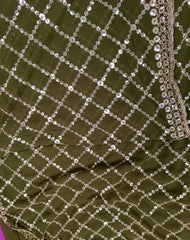 AFL3069 Partywear saree in green georgette fabric with silver sequins embroidery work.Comes with stitched blouse size 40,can be altered to 44 size.Fall peco done.
