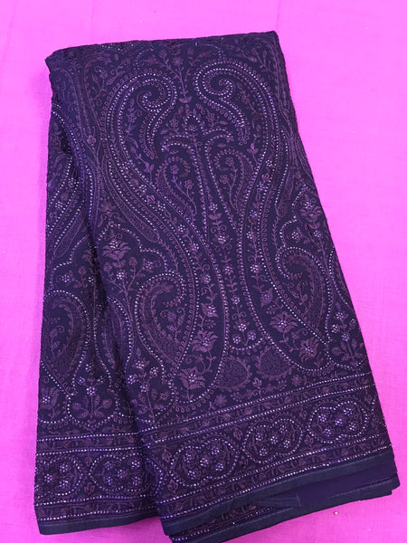 AFL3061 Georgette Party Wear saree in purple comes with Chickenkary Embroidery and stone work. Come with stitched blouse size 38 can be altered to 42.Fall peco done.