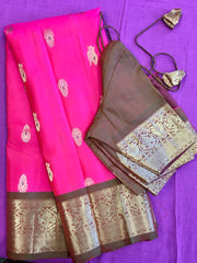 Pure kanchipuram Handloom Silk Saree in pink with Brown Zari border. Comess with Stitched Blouse size 38 can be altered up to 44
