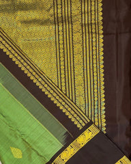 HPSS23 - Pure Handloom Silk Kanjivaram Saree in Green with Golden silver leaf butti. Contrast Black Border and Pallu