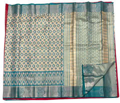 HPSS604 - Banarasi Soft Silk Saree in Cream with Blue Patola design. Peacock Zari Butta on Border. Comes with stitched blouse (size 38, can go up to size 42). Fall Peco Done.