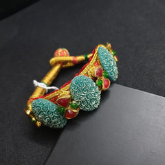 JP539 - Green carved stone kundan pochi