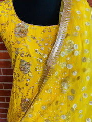 AMI106 - Party Wear Suit with High-Low design in Yellow with Heavy Sequin work. Comes with Dhoti Pants and Dupatta