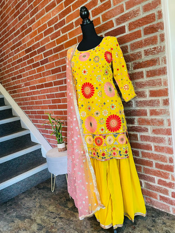 AMI109 - Party Wear Sharara Set in Yellow with Heavy Embroidery work. Comes with Pink Dupatta